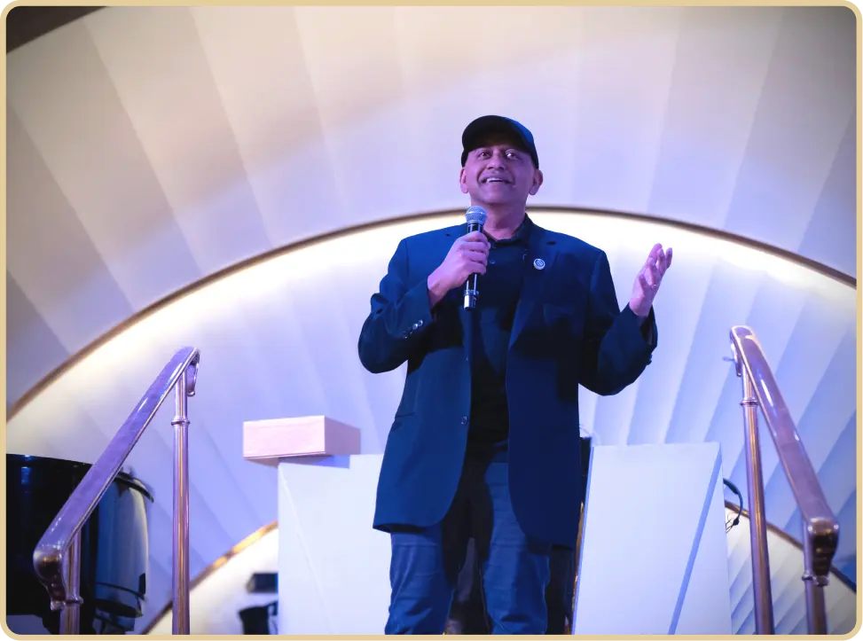 Sam Chauhan speaking on stage at Mindset Summit